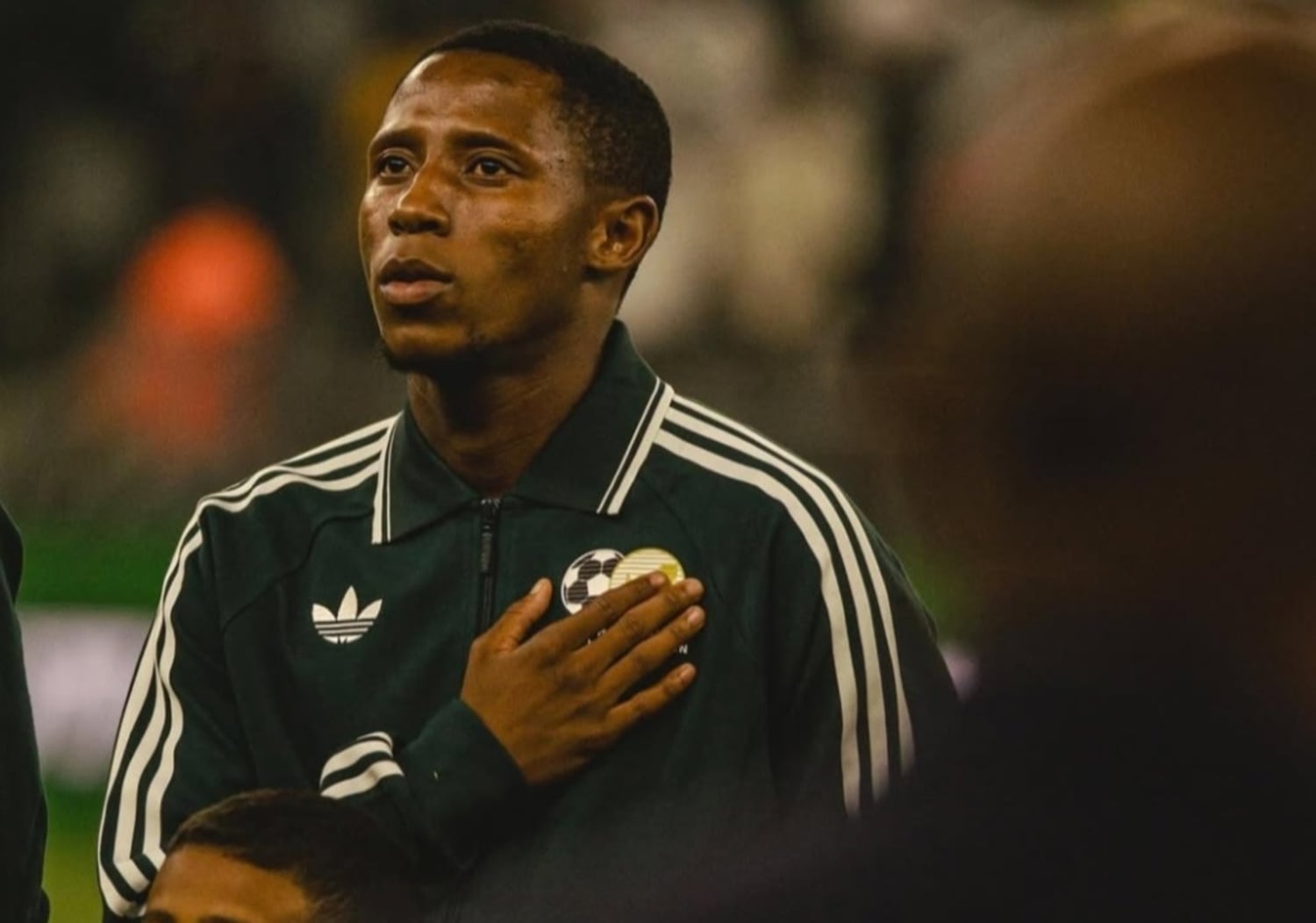 Orlando Pirates' Tshepang Moremi in Bafana Bafana colours singing the national anthem