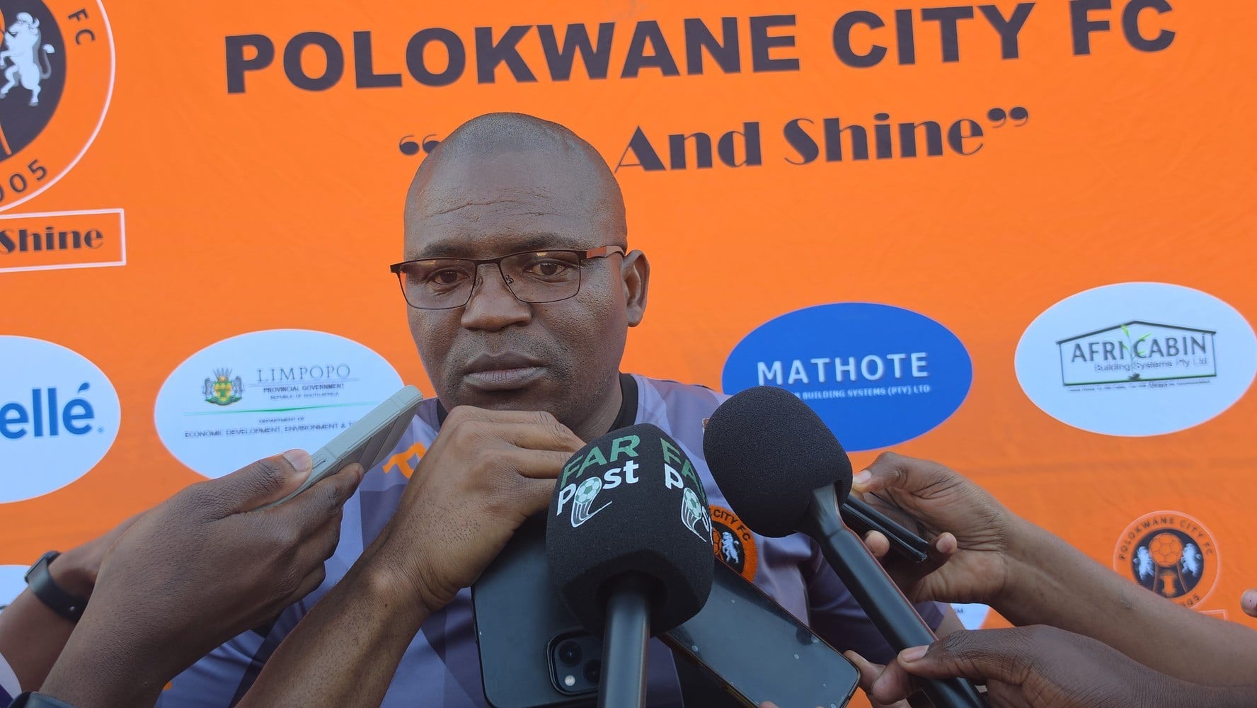 Willy Moloto addressing the media at the Old Peter Mokaba Stadium.