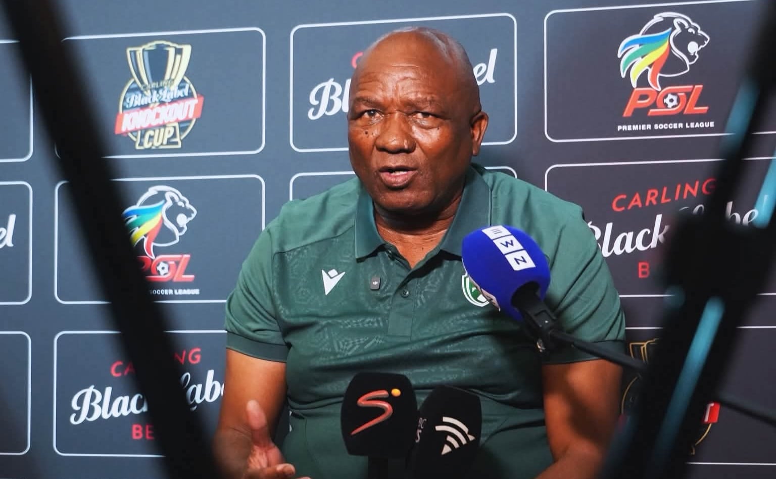 Siwelele FC coach Godfrey Mosoetsa addressing members of the media