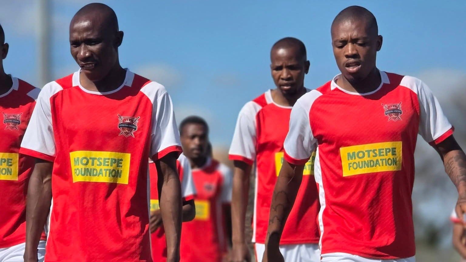 Gomora United players going through training session.