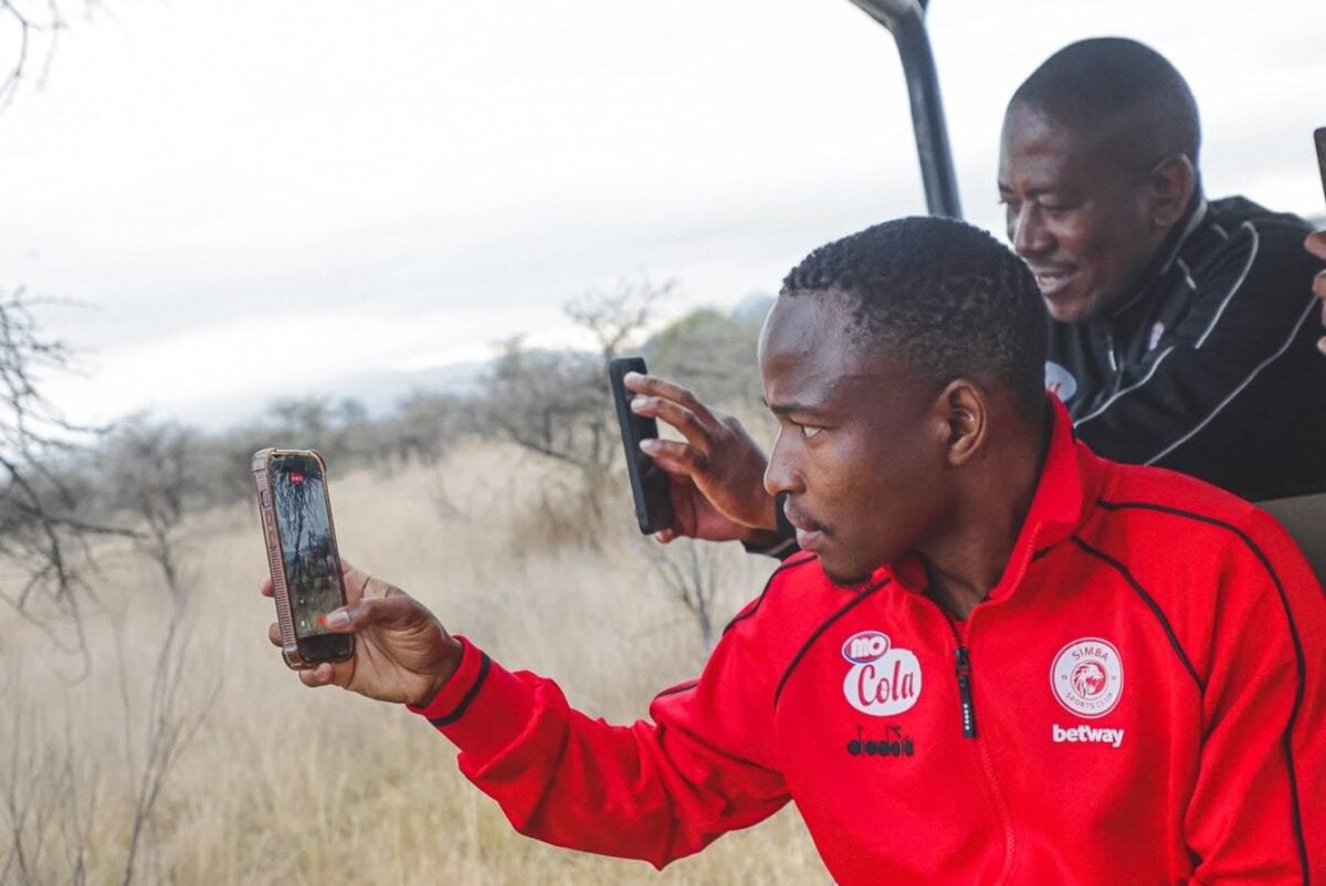Keletso Makgalwa talking a picture with Simba SC at the Ranch Resort.