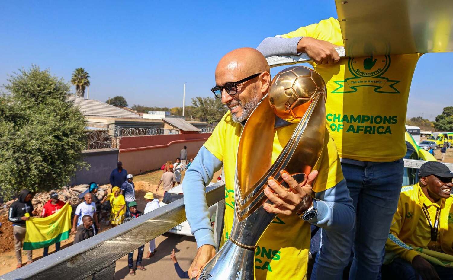 Miguel Cardoso holding the CAF Champions League trophy during a Mamelodi Sundowns trophy parade