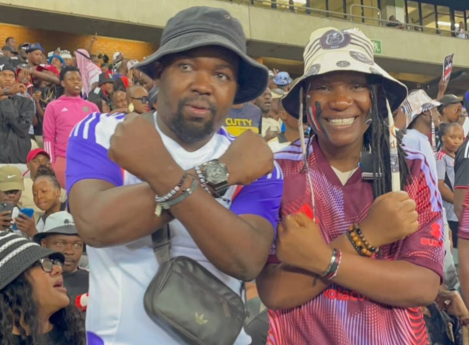 Mimi or Anoda Mirakle with an Orlando Pirates fan