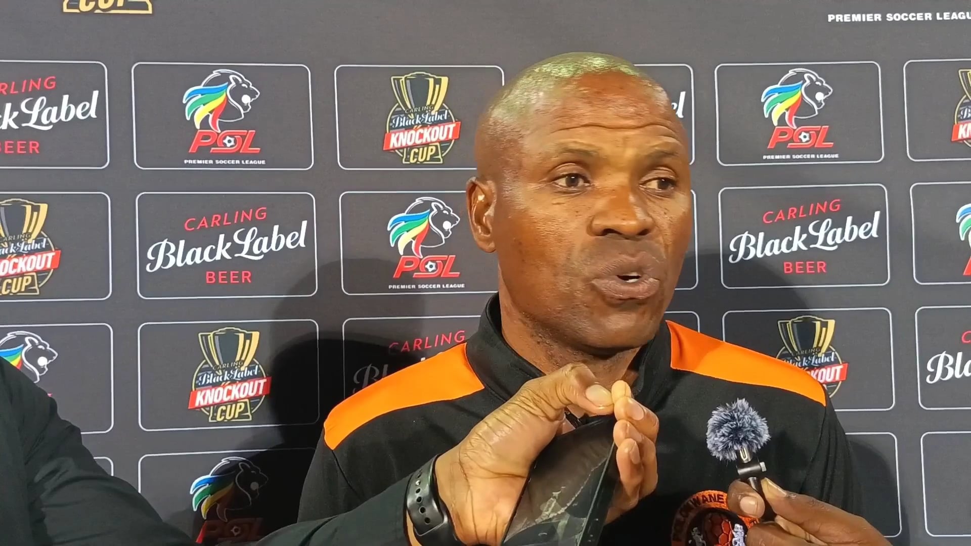 Polokwane City FC assistant coach Mkhuseli Sentane addressing members of the media at Old Peter Mokaba Stadium