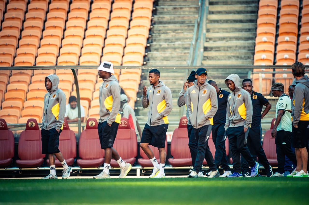 Rushwin Dortley with his Kaizer Chiefs teammates during pitch inspection