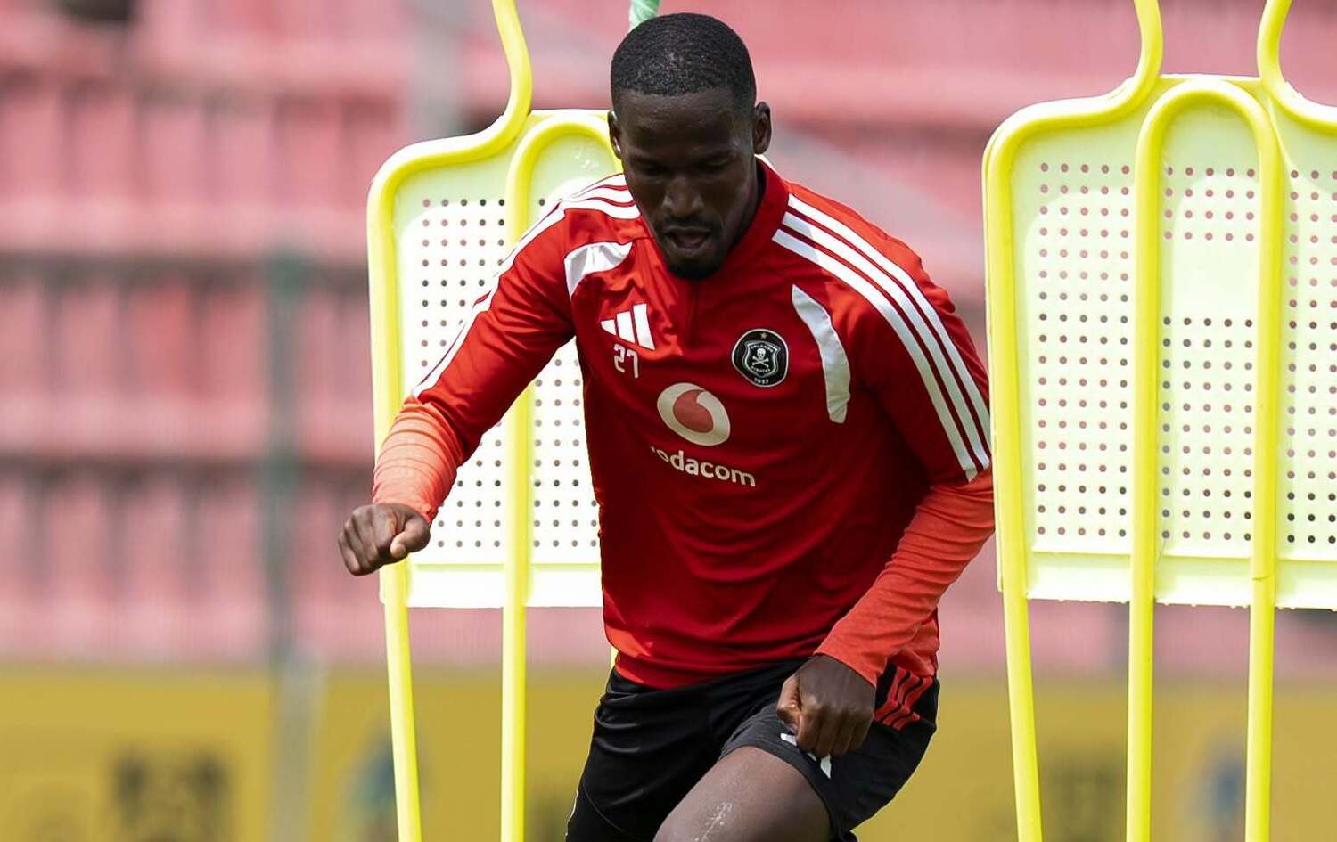 Tapelo Xoki dribbling the ball during an Orlando Pirates training session