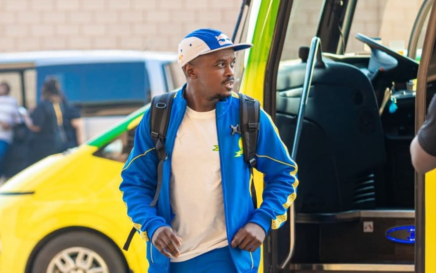 Teboho Mokoena walking out of the Mamelodi Sundowns bus