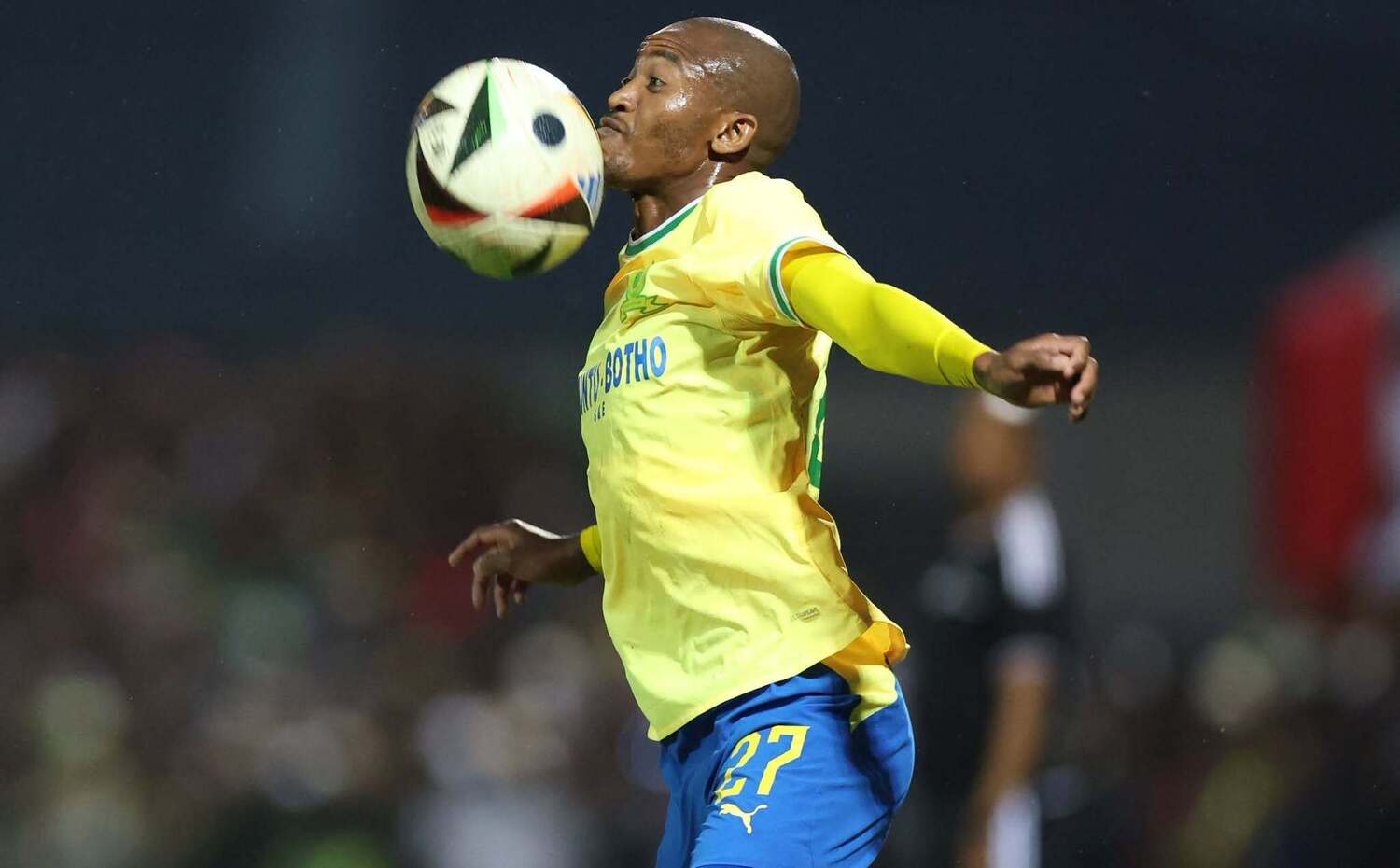 Thapelo Morena controls the ball with his chest during a Mamelodi Sundowns match